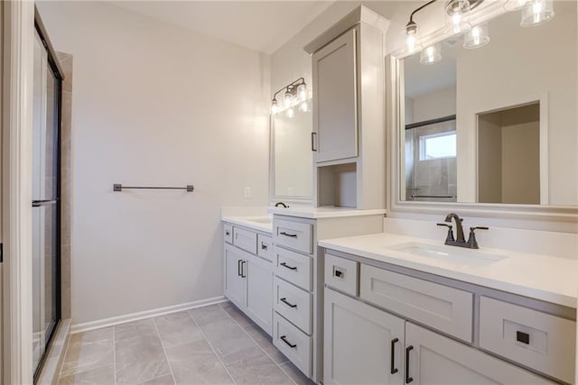 bathroom with vanity and an enclosed shower