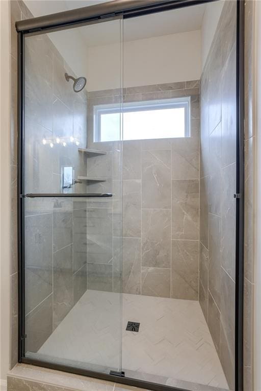 bathroom with an enclosed shower