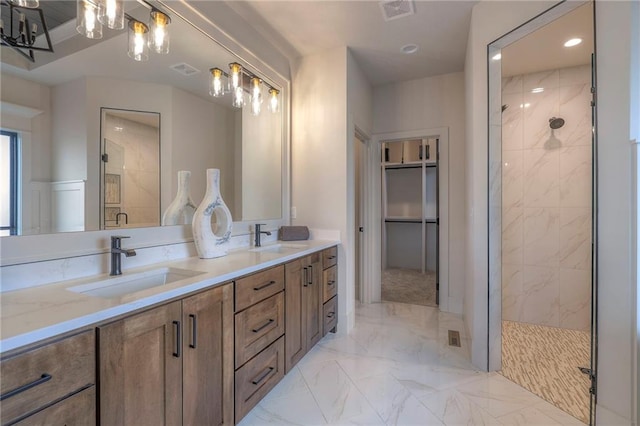 bathroom featuring vanity and walk in shower