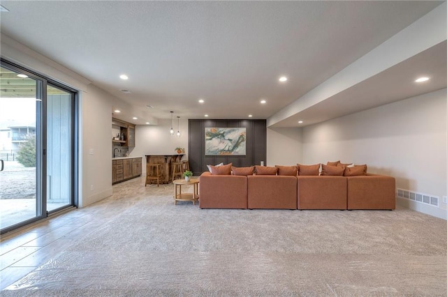 living room with light colored carpet