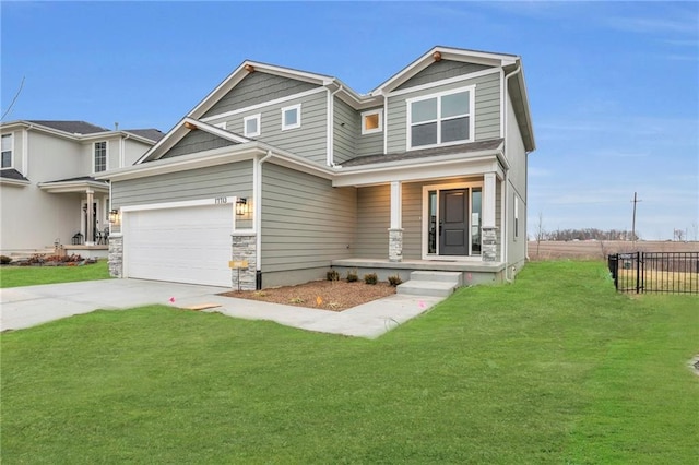 craftsman-style home with covered porch and a front lawn