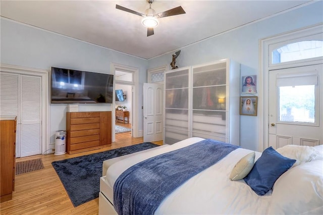bedroom featuring ceiling fan and wood finished floors