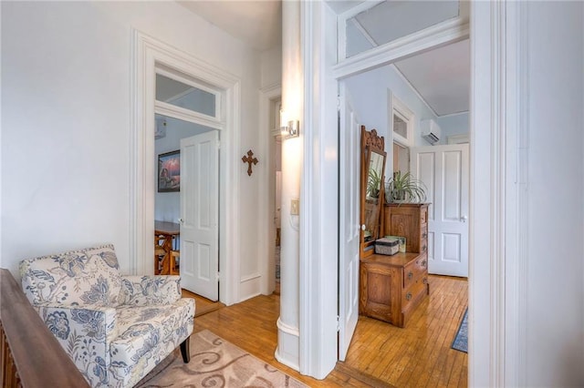 corridor with light wood finished floors