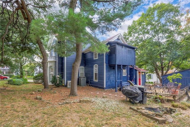 view of front of home with central AC