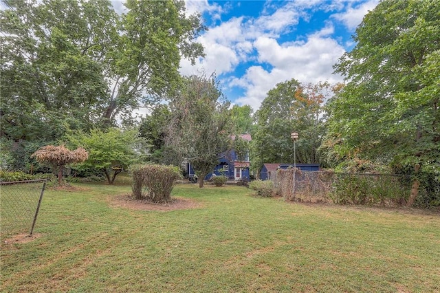 view of yard featuring fence