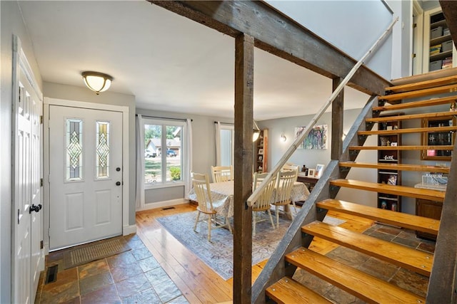 entrance foyer with beam ceiling