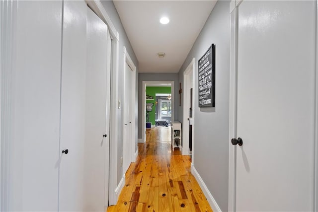 hallway featuring light hardwood / wood-style floors