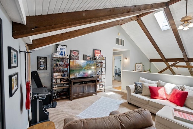 living room featuring light colored carpet and lofted ceiling with skylight