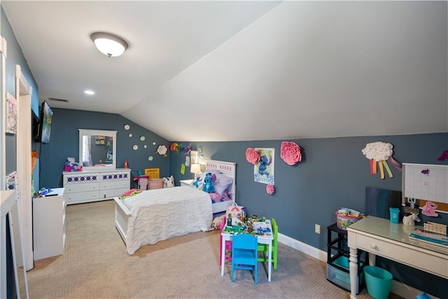 carpeted bedroom featuring vaulted ceiling