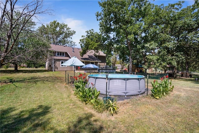 view of yard featuring a storage unit