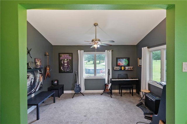 2924 Crown Dr, Independence, KS 67301 - sitting room featuring light colored carpet, ceiling fan, plenty of natural light, and vaulted ceiling