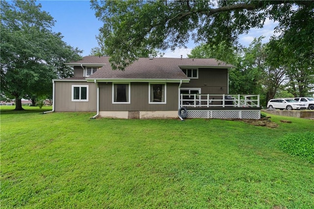 2924 Crown Dr, Independence, KS 67301 - back of property with a deck and a lawn