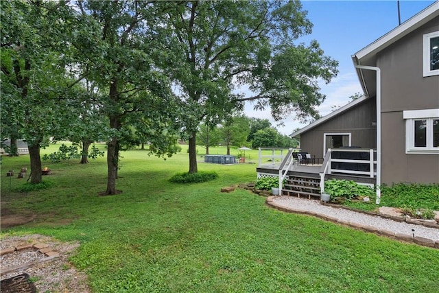 2924 Crown Dr, Independence, KS 67301 - view of grassy yard with a wooden deck