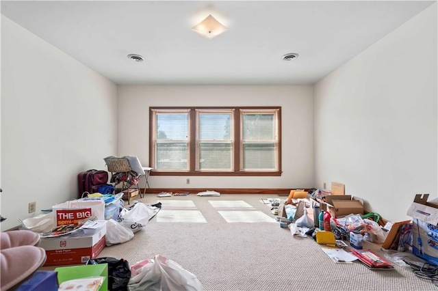 recreation room featuring carpet flooring