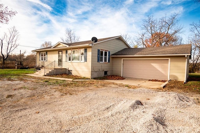 view of front of property featuring a garage