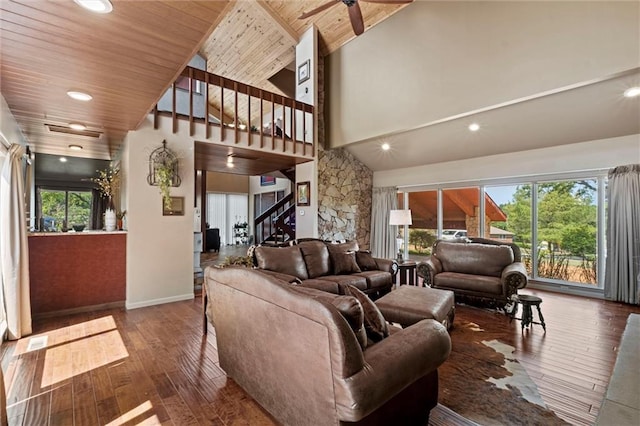 living room featuring hardwood / wood-style floors, wooden ceiling, ceiling fan, and plenty of natural light