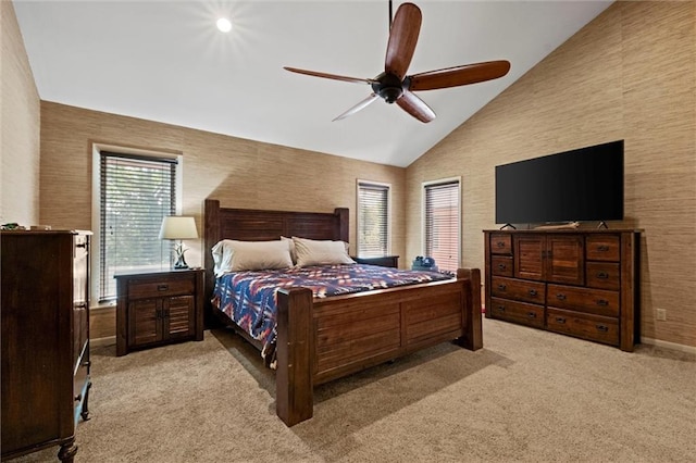 carpeted bedroom with high vaulted ceiling and ceiling fan