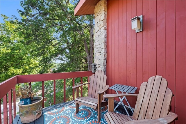 wooden balcony featuring a deck