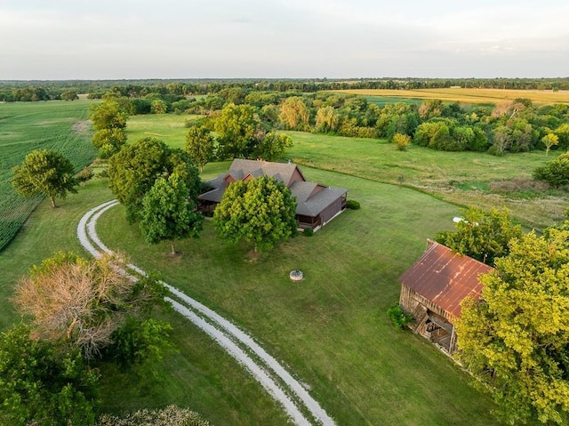 birds eye view of property featuring a rural view