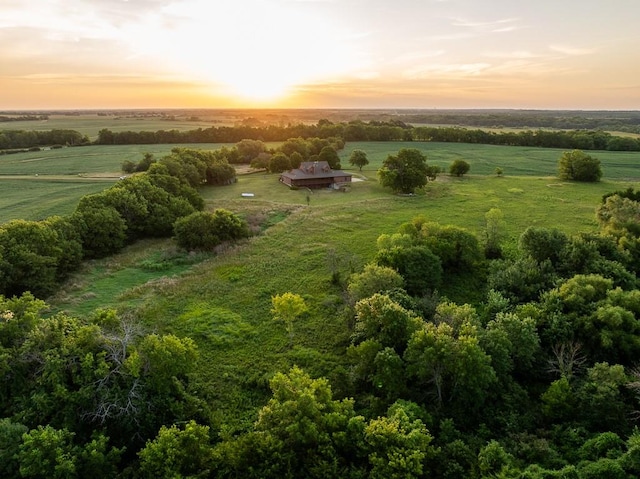 aerial view at dusk with a rural view