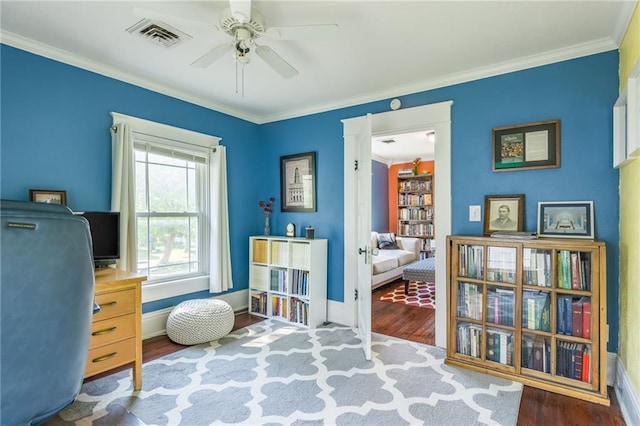 office area with hardwood / wood-style floors, ceiling fan, and ornamental molding