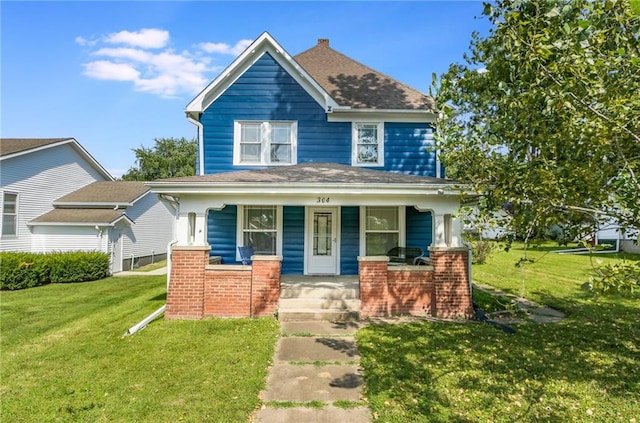 view of front of house featuring a porch and a front lawn