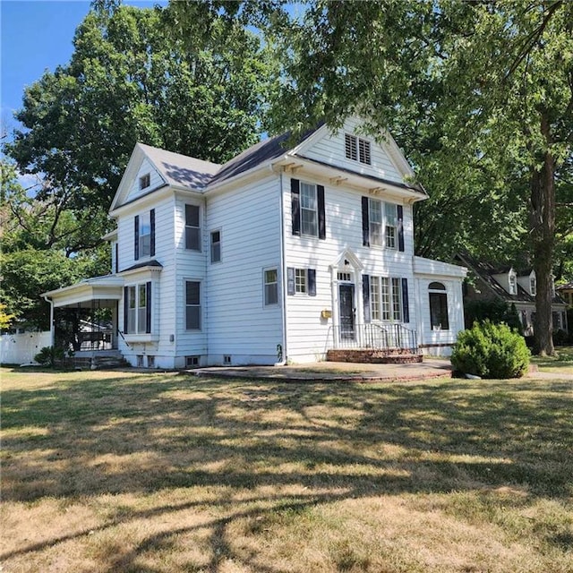 view of front facade with a front lawn