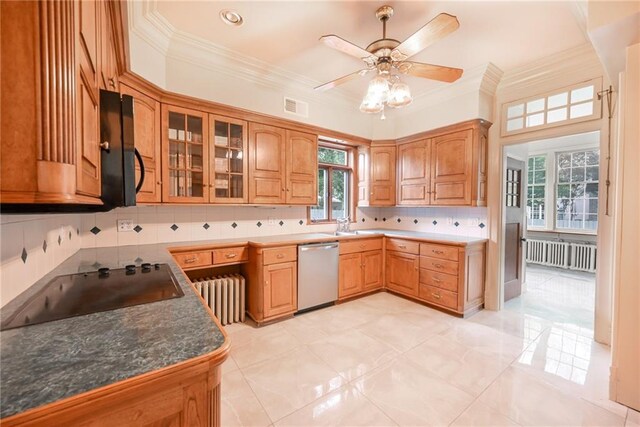 kitchen featuring light tile patterned flooring, tasteful backsplash, ceiling fan, radiator, and dishwasher