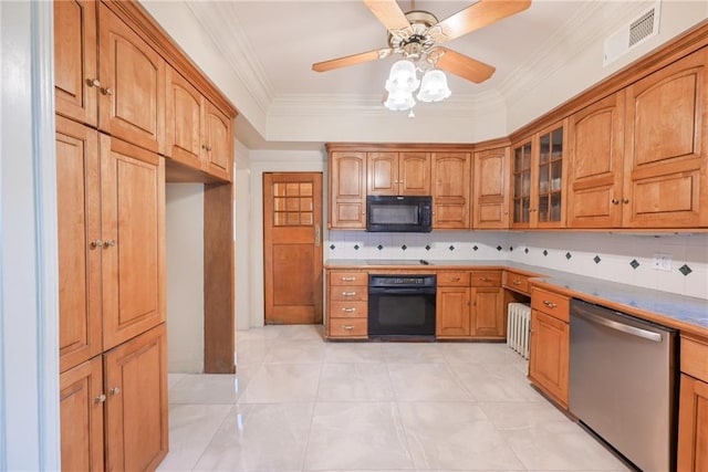 kitchen featuring black appliances, backsplash, light tile patterned floors, radiator heating unit, and ceiling fan