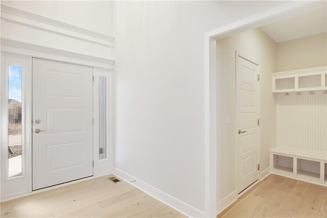 7004 NE 102nd Ct, Kansas City, MO 64156 - entrance foyer with light wood-style floors and baseboards