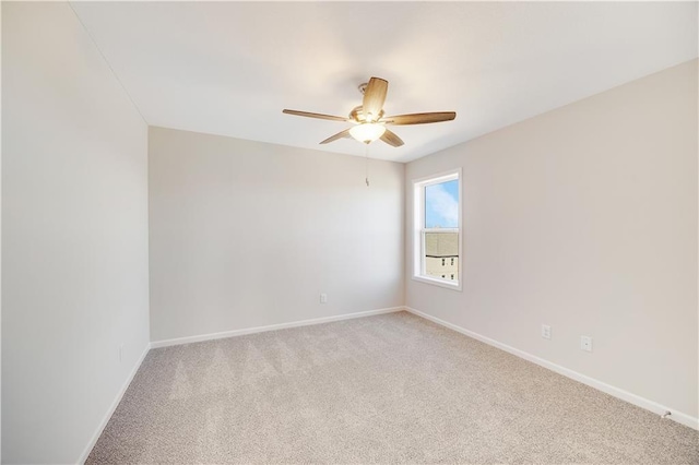 7004 NE 102nd Ct, Kansas City, MO 64156 - empty room with light colored carpet and ceiling fan
