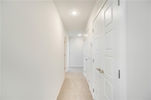 7004 NE 102nd Ct, Kansas City, MO 64156 - hall featuring recessed lighting and light colored carpet