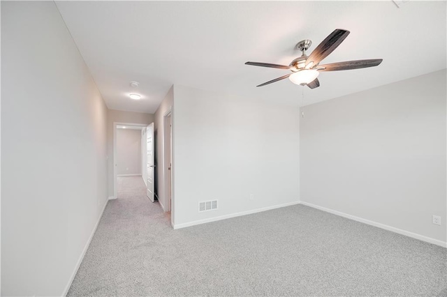 7004 NE 102nd Ct, Kansas City, MO 64156 - empty room with ceiling fan and carpet