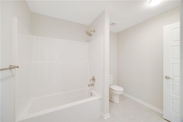 7004 NE 102nd Ct, Kansas City, MO 64156 - bathroom featuring bathing tub / shower combination and tile patterned flooring