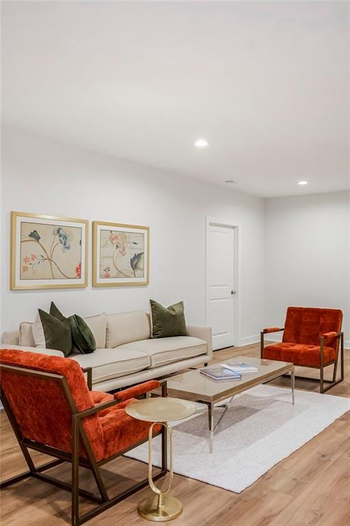 living room with light hardwood / wood-style floors