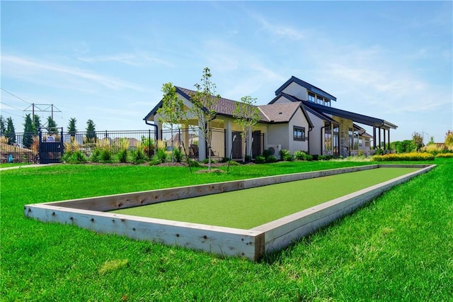 view of community with a lawn