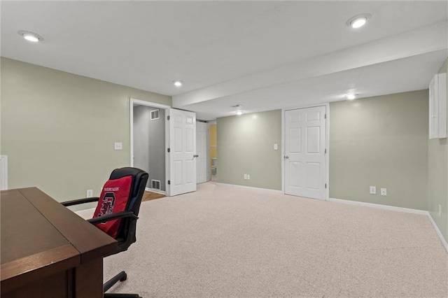 office space with light colored carpet