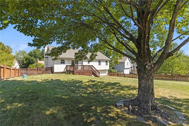 view of yard with a wooden deck