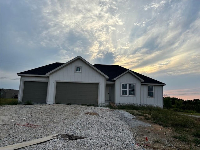 view of front of property with a garage