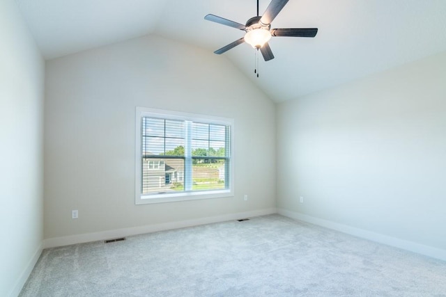 unfurnished room featuring carpet floors, ceiling fan, and lofted ceiling