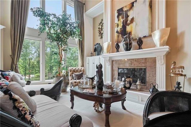 sitting room featuring a premium fireplace