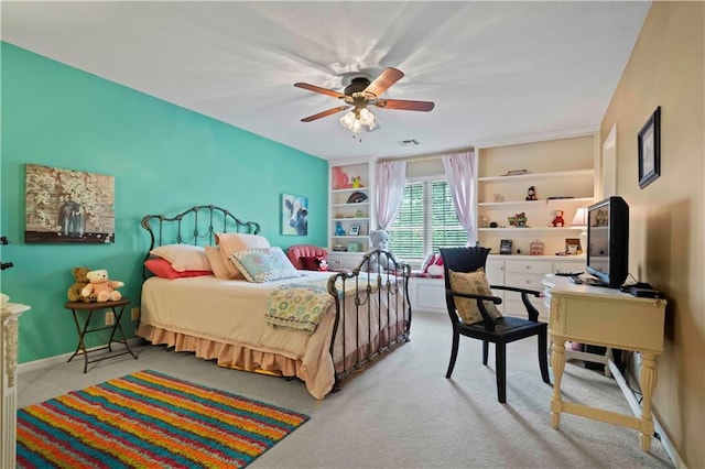 bedroom with carpet flooring, a ceiling fan, and baseboards