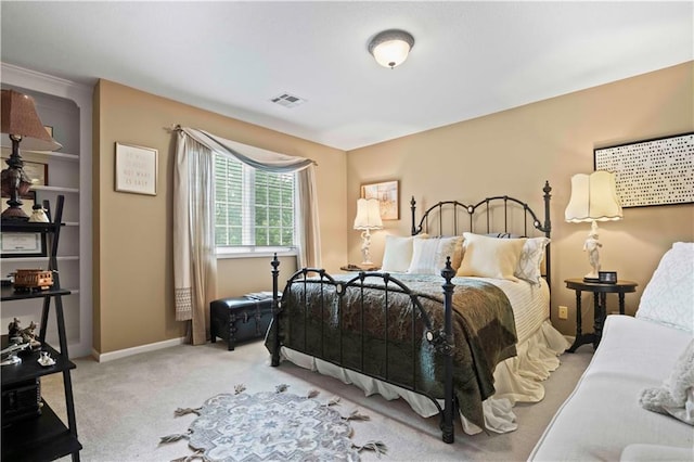 bedroom featuring carpet, visible vents, and baseboards