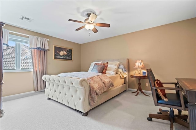 bedroom with baseboards, visible vents, ceiling fan, and carpet flooring