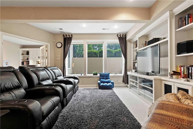 living area featuring baseboards, recessed lighting, visible vents, and light colored carpet