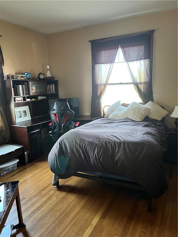 bedroom featuring light wood-type flooring