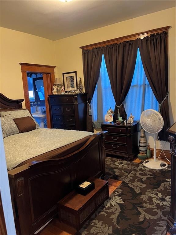 bedroom featuring wood-type flooring