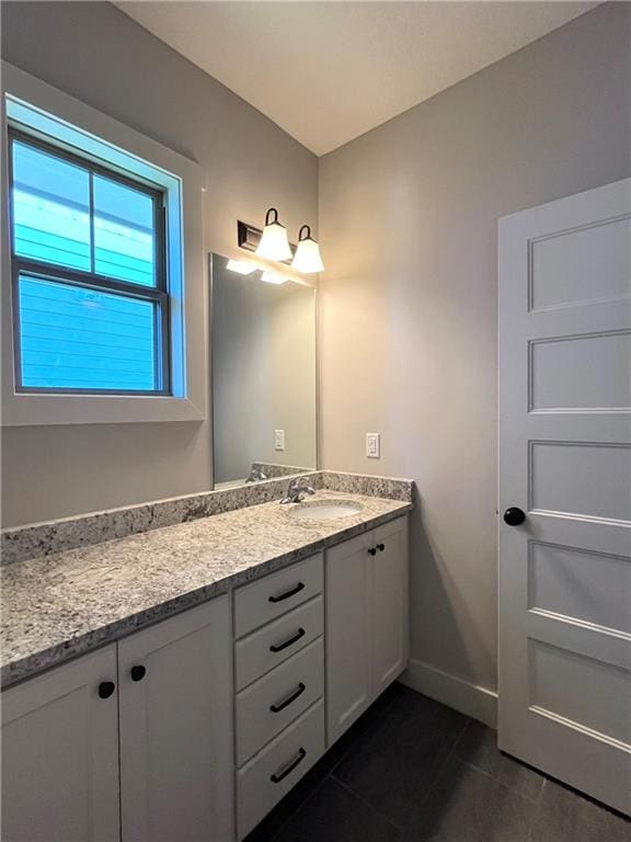 bathroom featuring vanity and tile patterned floors