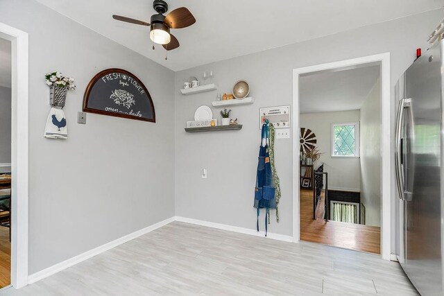 interior space featuring light hardwood / wood-style flooring and ceiling fan