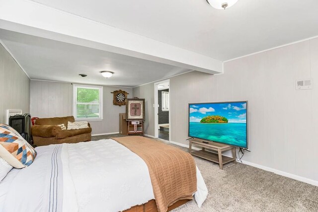 carpeted bedroom with crown molding